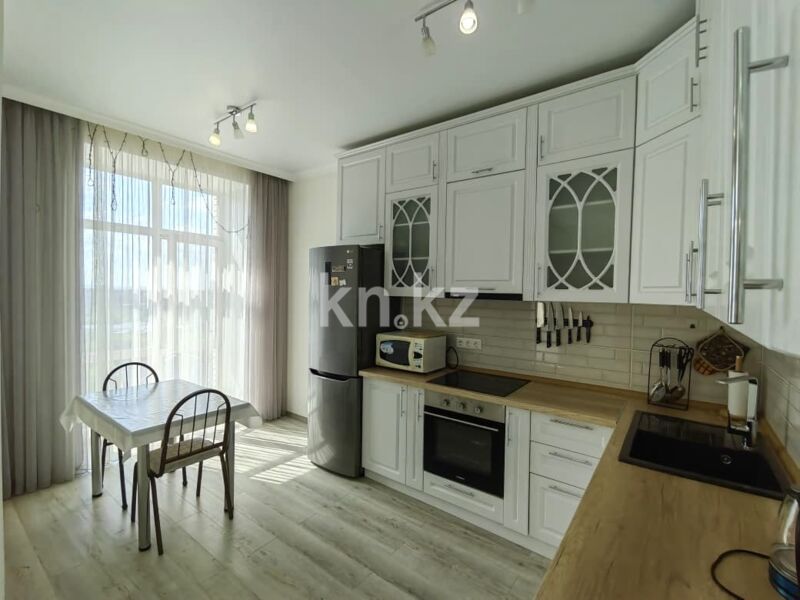 Продажа 2-комнатной квартиры, 63.4 м² - Продажа двухкомнатных квартир в кирпичном доме в Караганде - страница 8 фото 1 из 40