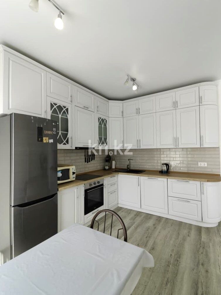 Продажа 2-комнатной квартиры, 63.4 м² - Продажа двухкомнатных квартир в кирпичном доме в Караганде - страница 8 фото 8 из 40