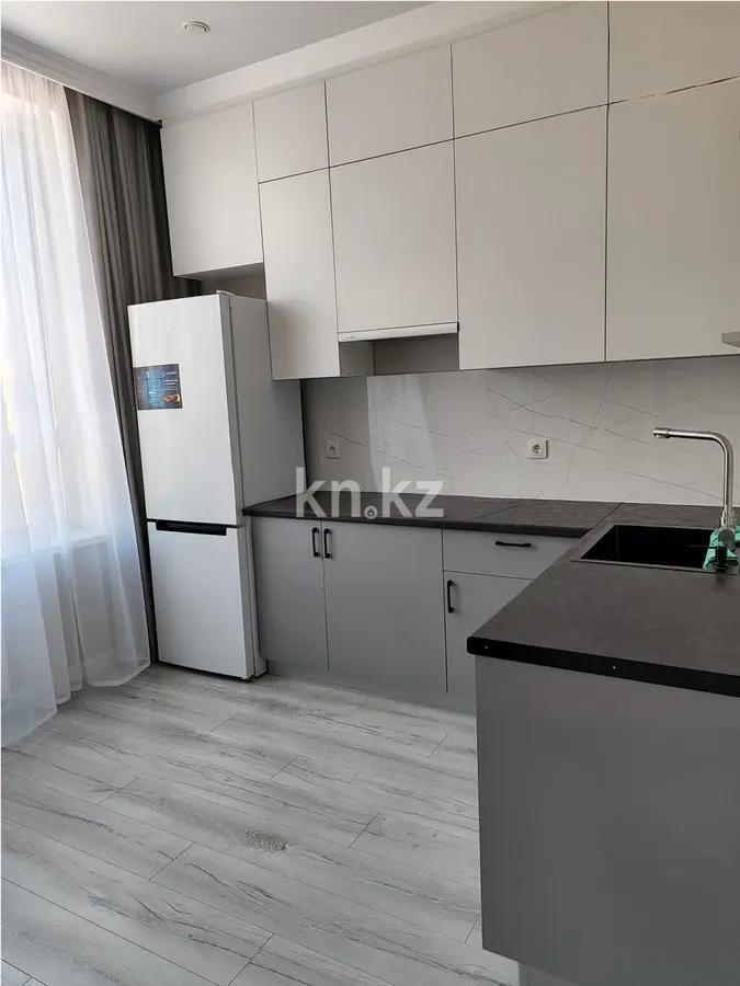 Продажа 1-комнатной квартиры, 40 м², ул. Толе би, дом  59 в Астане - фото 2