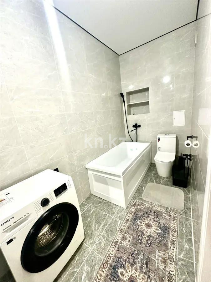 Продажа 2-комнатной квартиры, 56 м², мкр. Нуркент, дом  6/2 в Алматы - фото 4