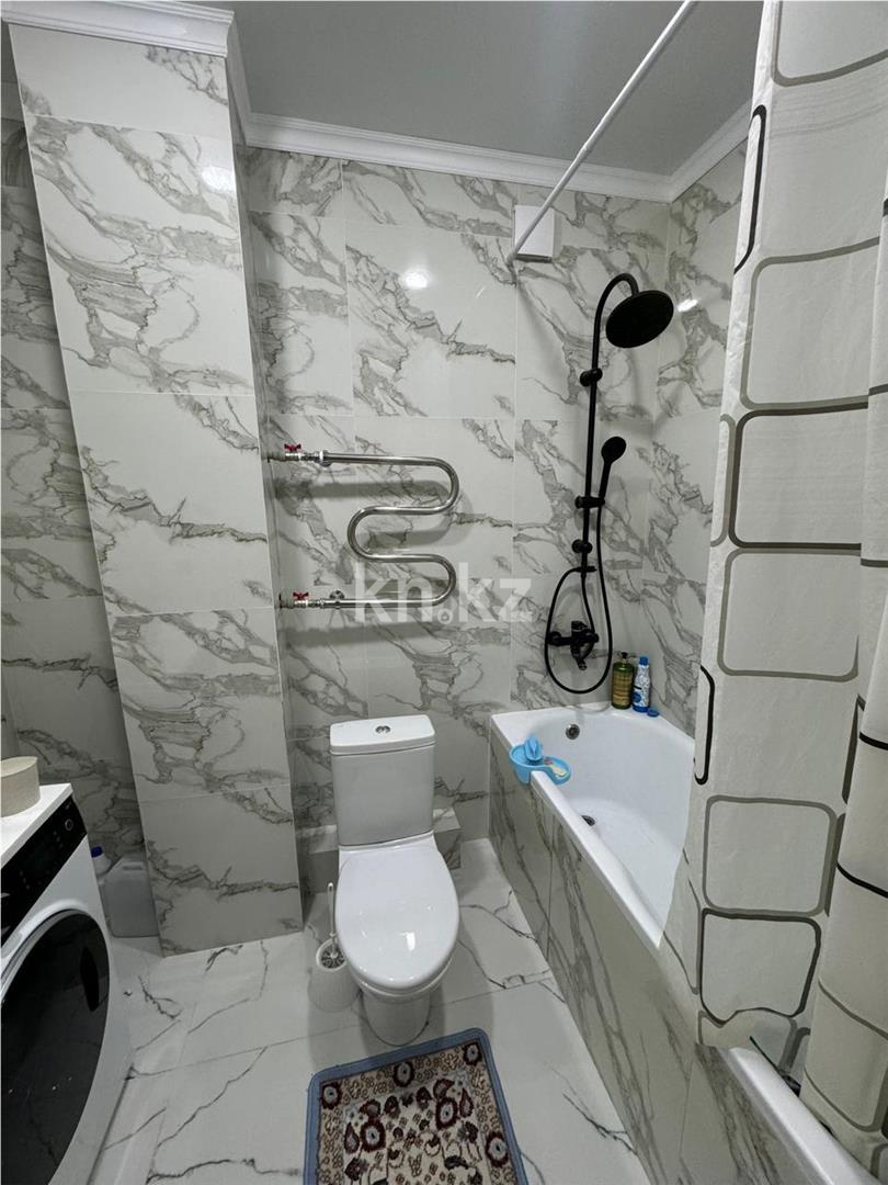 Продажа 2-комнатной квартиры, 55 м², ул. Сыганак в Астане - фото 7