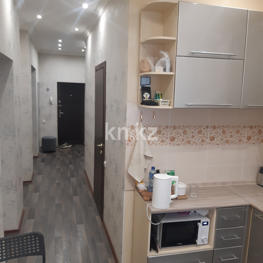 Продажа 2-комнатной квартиры, 56 м², ул. Сарсекова, дом  55 в Караганде - фото 21