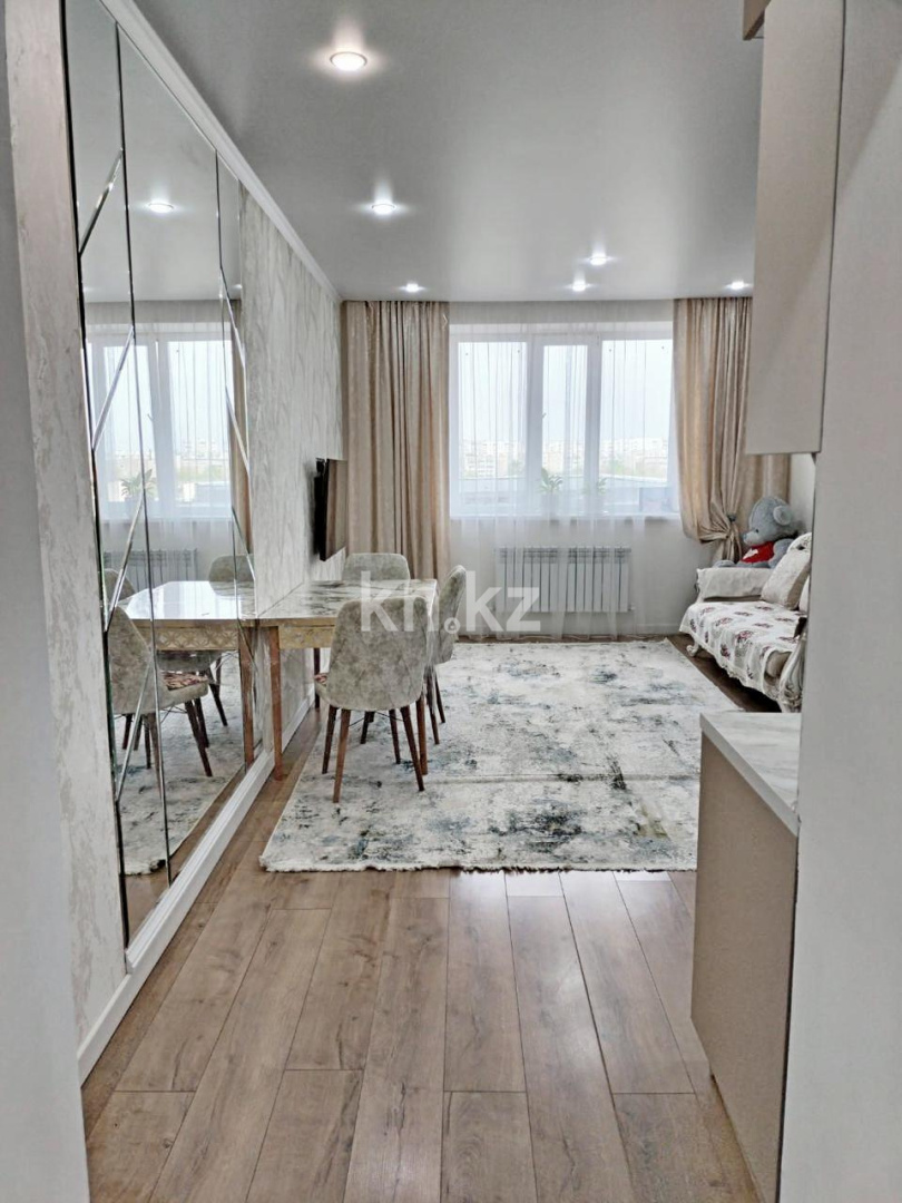 Продажа 2-комнатной квартиры, 64 м², мкр-н Голубые Пруды, дом  7/14 - Продажа  двухкомнатных квартир в новостройках Караганды фото 1 из 9