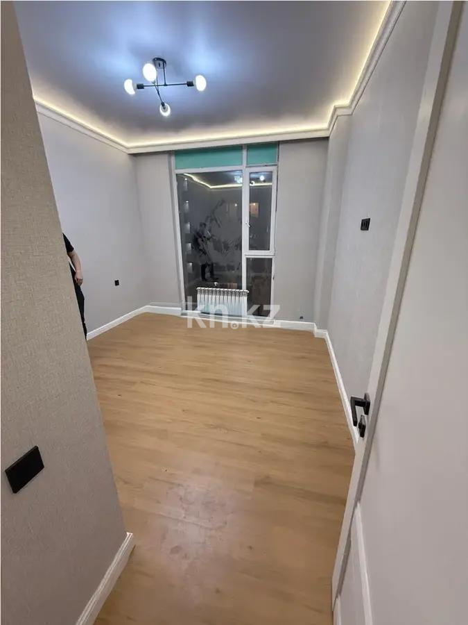 Продажа 2-комнатной квартиры, 57 м², ул. Сыганак, дом  4 стр в Астане - фото 2