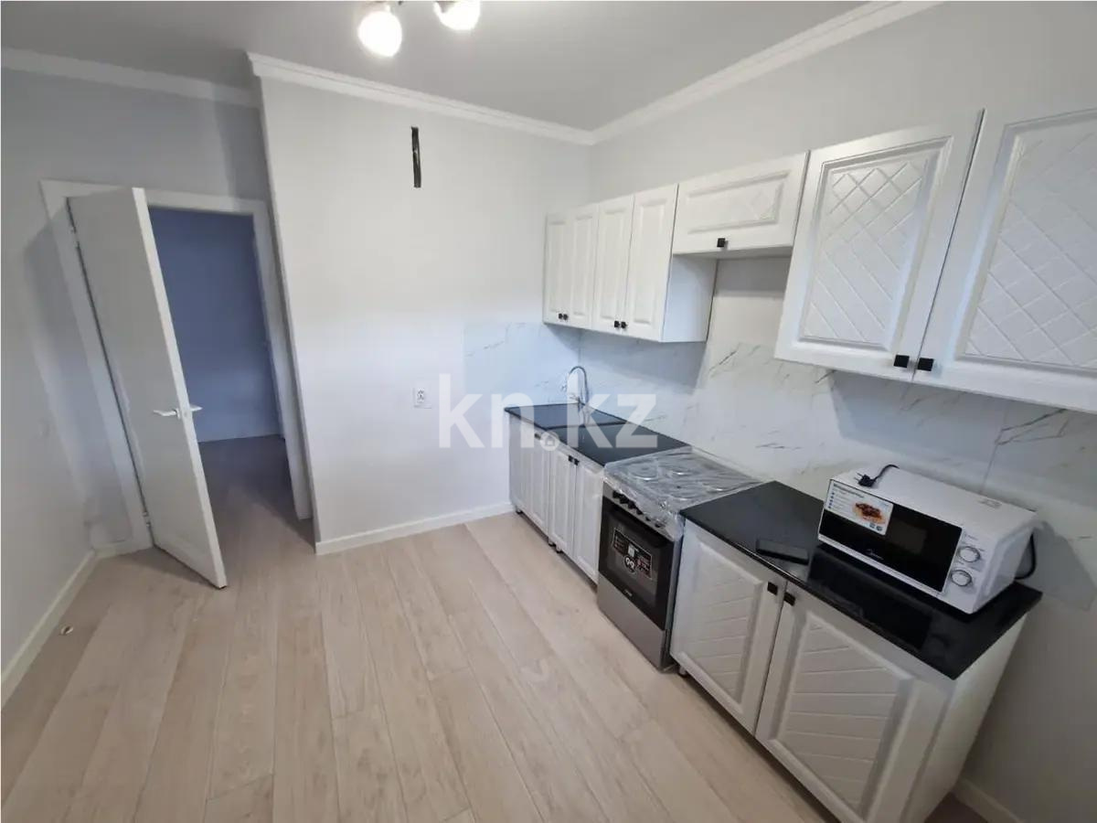 Продажа 1-комнатной квартиры, 38 м², ул. Толе би, дом  46 в Астане - фото 2