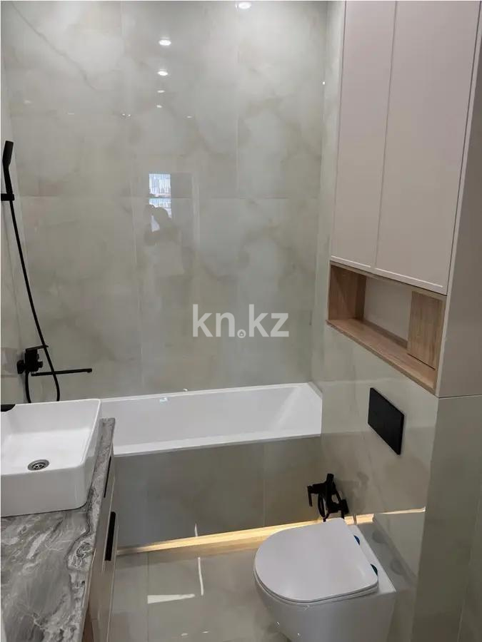 Продажа 2-комнатной квартиры, 63 м², ул. Нарикбаева, дом  14 в Астане - фото 4