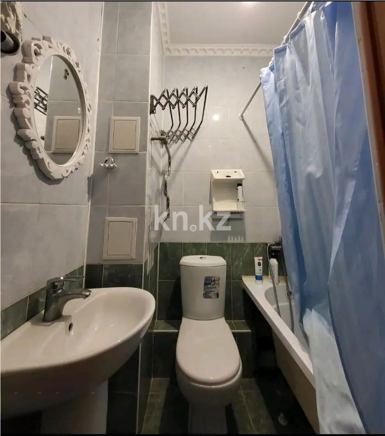 Продажа 1-комнатной квартиры, 56.5 м², ул. Омарова, дом  10 в Астане - фото 2