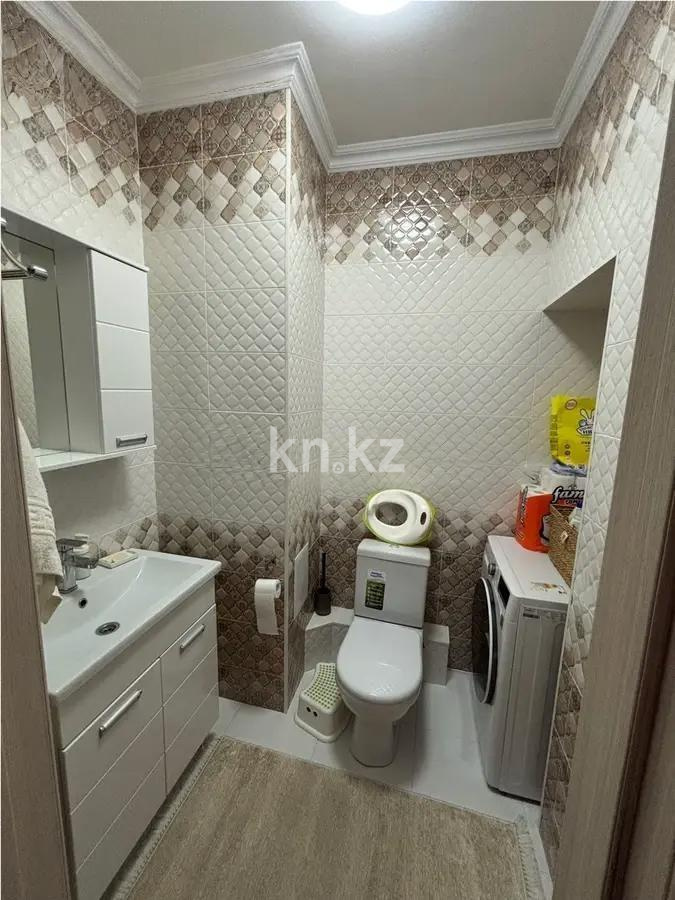 Продажа 2-комнатной квартиры, 67 м², ул. Сыганак, дом  11 в Астане - фото 5