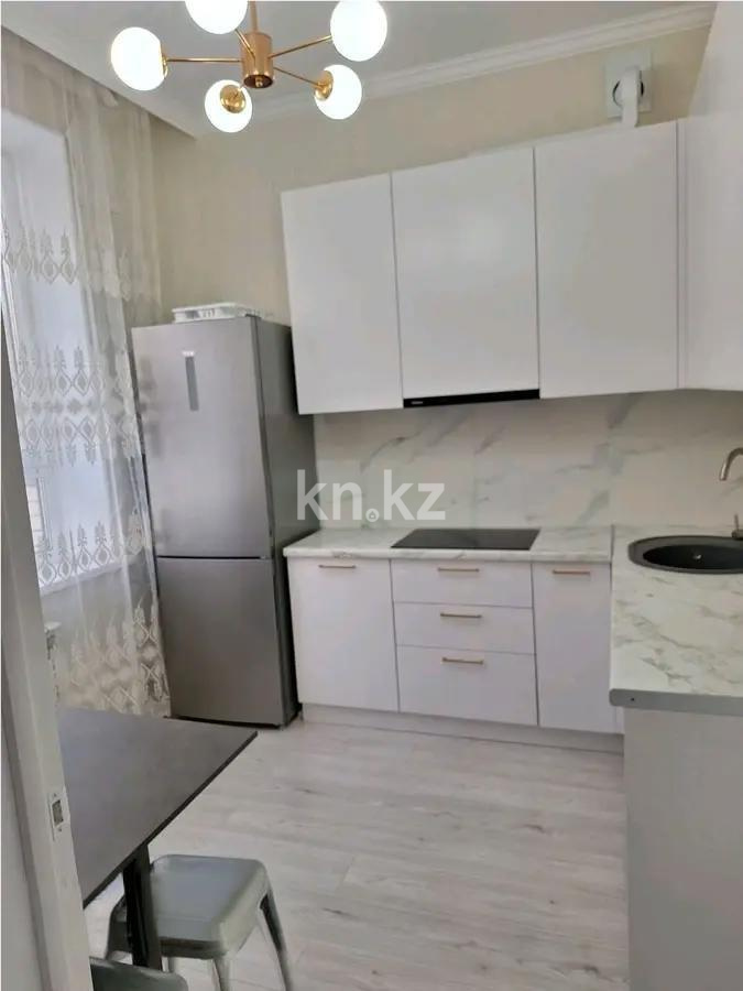 Продажа 2-комнатной квартиры, 50 м², ул. Толе би, дом  12/1 в Астане - фото 2