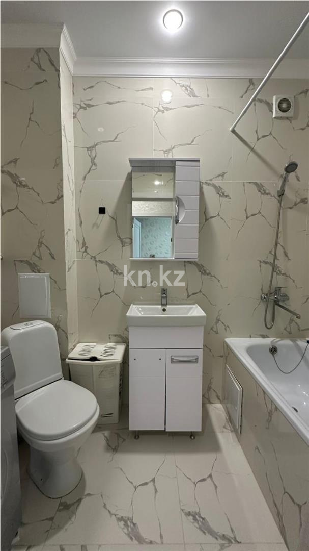 Продажа 2-комнатной квартиры, 65.3 м², пр. Тауелсыздык в Астане - фото 7