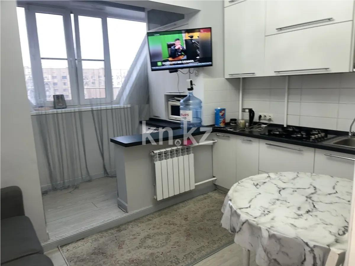 Продажа 2-комнатной квартиры, 52 м², мкр. Аксай-4, дом  39 в Алматы - фото 2