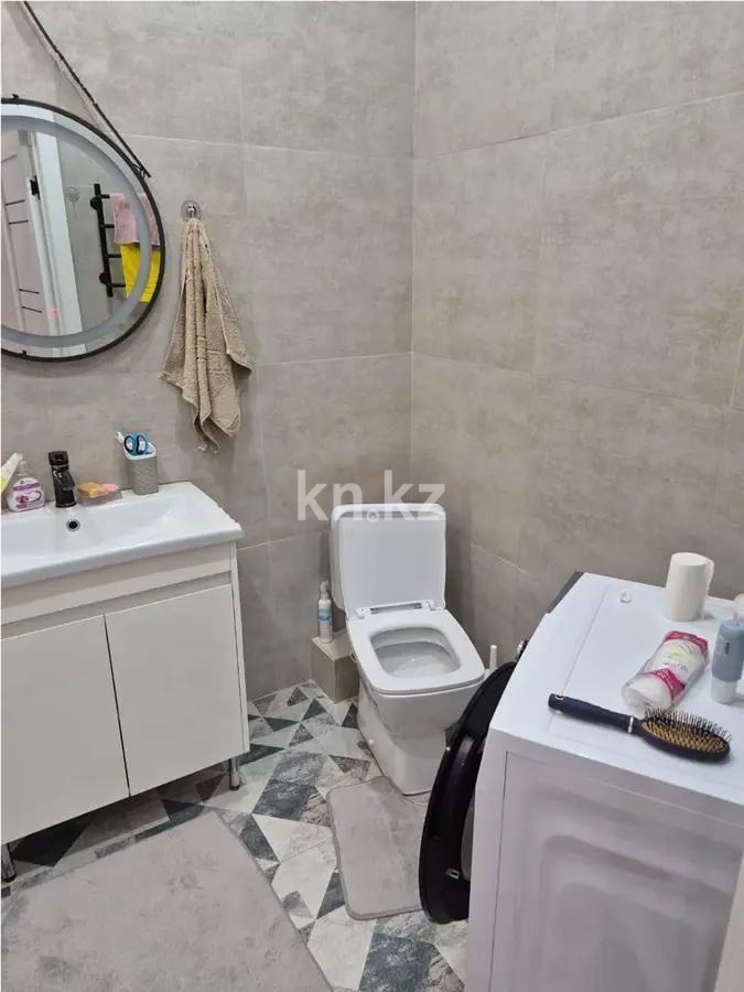 Продажа 2-комнатной квартиры, 60 м², ул. Сыганак, дом  1 в Астане - фото 4