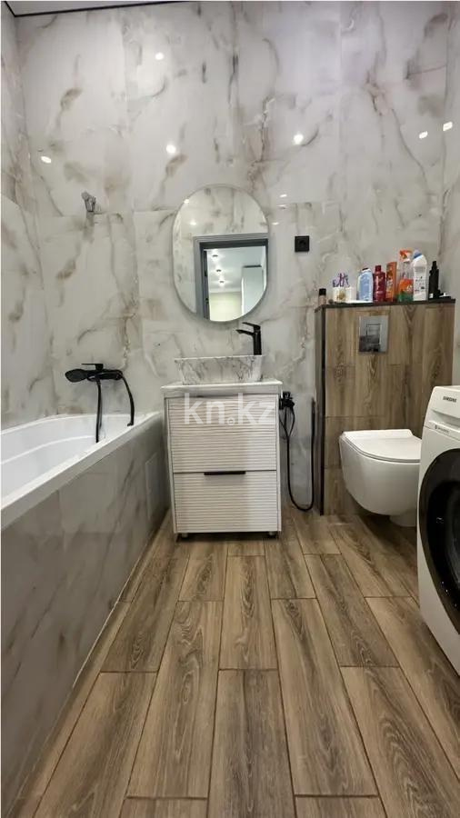 Продажа 2-комнатной квартиры, 64.25 м², ул. Казыбек би, дом  7 в Астане - фото 4