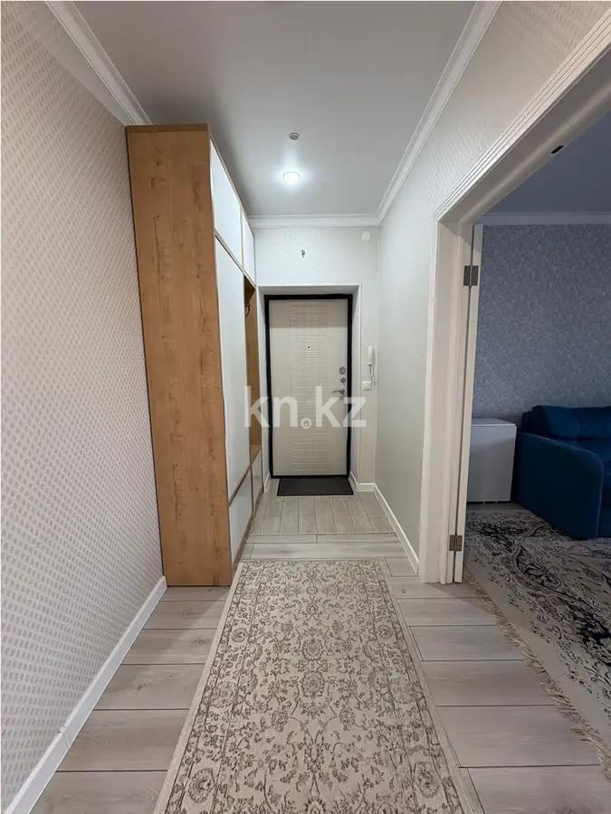 Продажа 2-комнатной квартиры, 56 м², пр. Кошкарбаева, дом  31 в Астане - фото 3