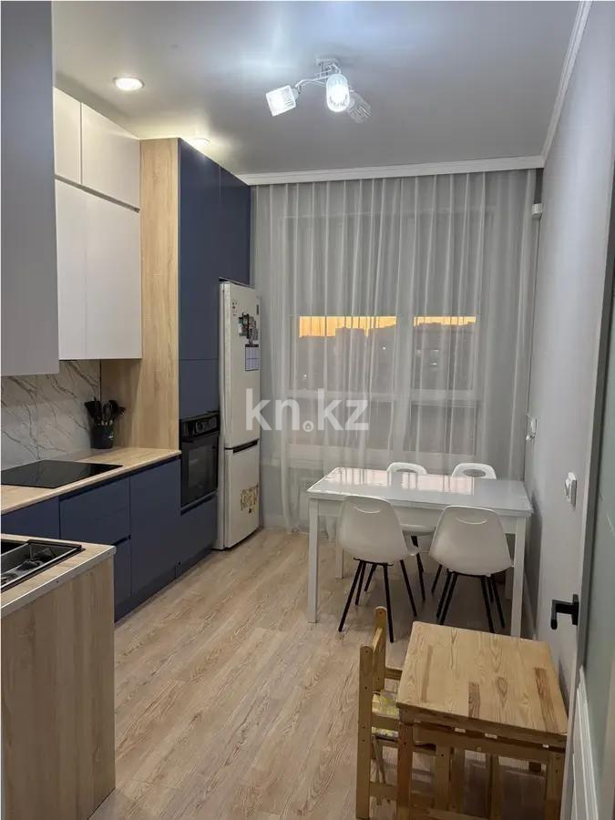 Продажа 2-комнатной квартиры, 61 м², ул. Омарова, дом  2/1 в Астане - фото 3