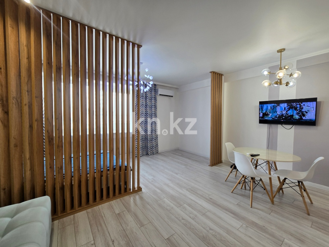 Продажа 2-комнатной квартиры, 65 м², ул. Толе би, дом  286\1 в Алматы - фото 4