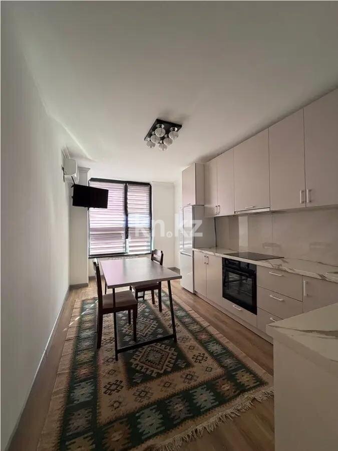 Продажа 1-комнатной квартиры, 40.3 м² в Алматы - фото 2