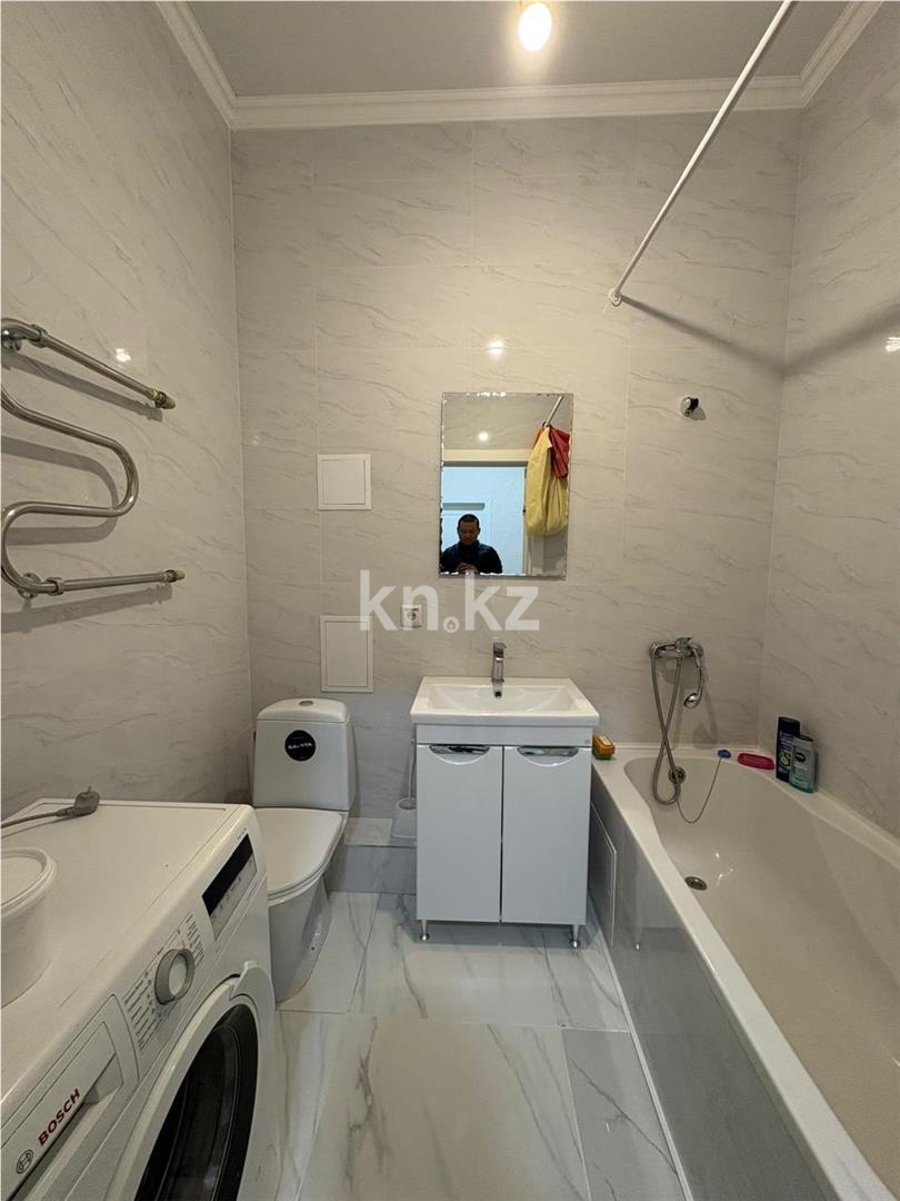 Продажа 2-комнатной квартиры, 56 м², пр. Туран в Астане - фото 11