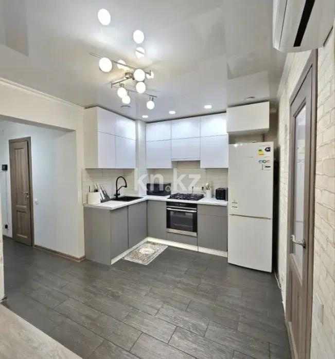 Продажа 2-комнатной квартиры, 54 м², мкр-н Аксай-5, дом  25 в Алматы - фото 2