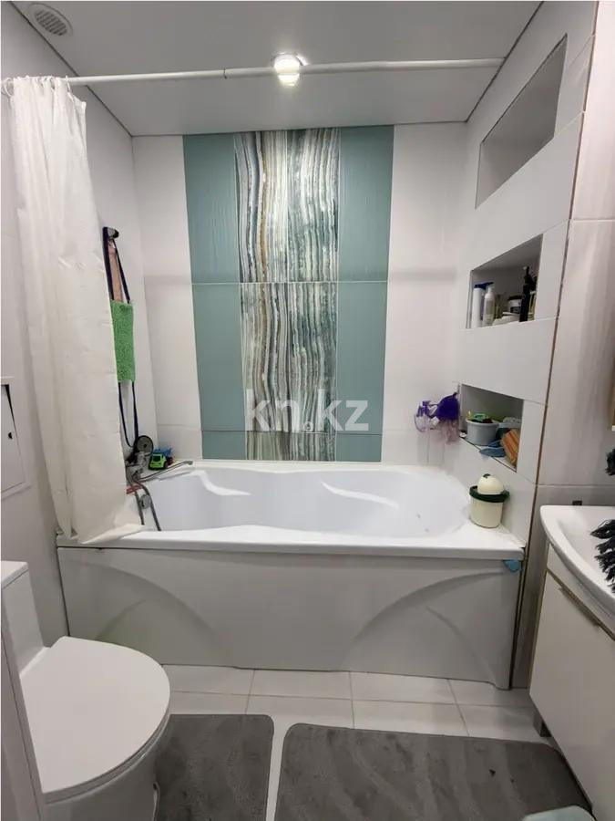 Продажа 3-комнатной квартиры, 83 м², ул. Омарова, дом  27 в Астане - фото 4