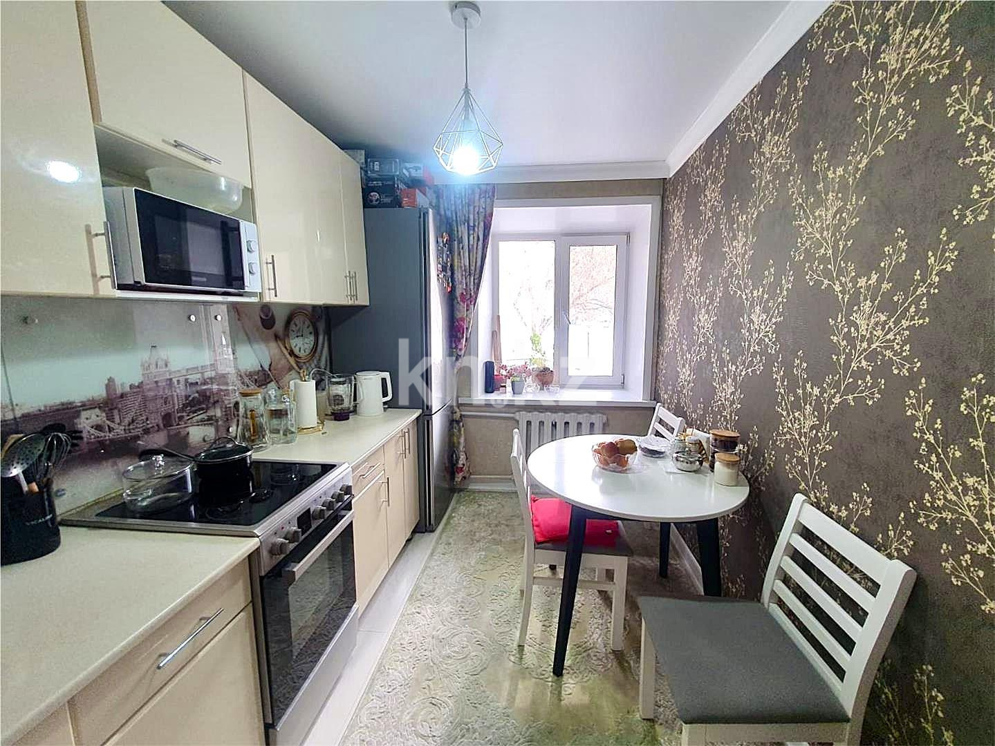 Продажа 3-комнатной квартиры, 57 м², ул. Аманжолова в Караганде - фото 7