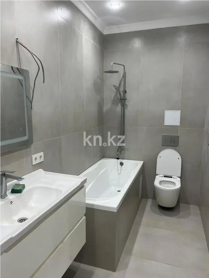 Продажа 2-комнатной квартиры, 57 м², мкр-н Нуркент, дом  6/2 в Алматы - фото 4