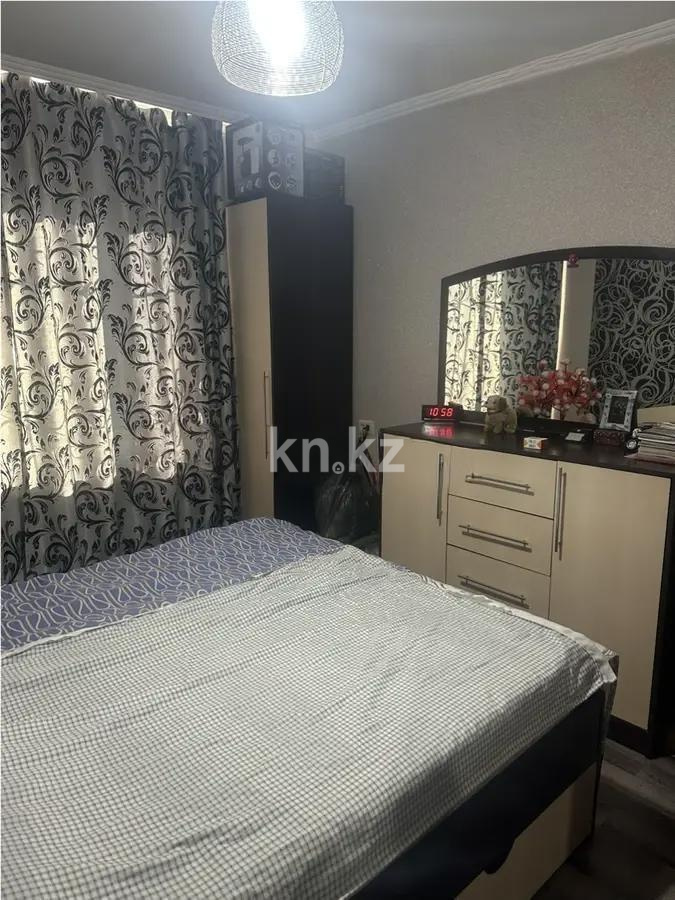 Продажа 2-комнатной квартиры, 52 м², мкр-н Восток-3, дом  13 в Караганде - фото 2