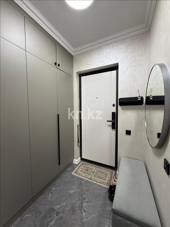 Продажа 2-комнатной квартиры, 52 м², ул. Толе би, дом  285/8 к13 - ул. Утеген батыра в Алматы - фото 9