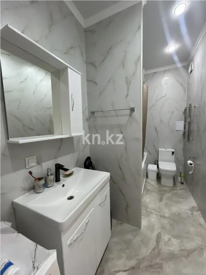 Продажа 2-комнатной квартиры, 56 м², мкр-н Нуркент, дом  6/2 в Алматы - фото 4