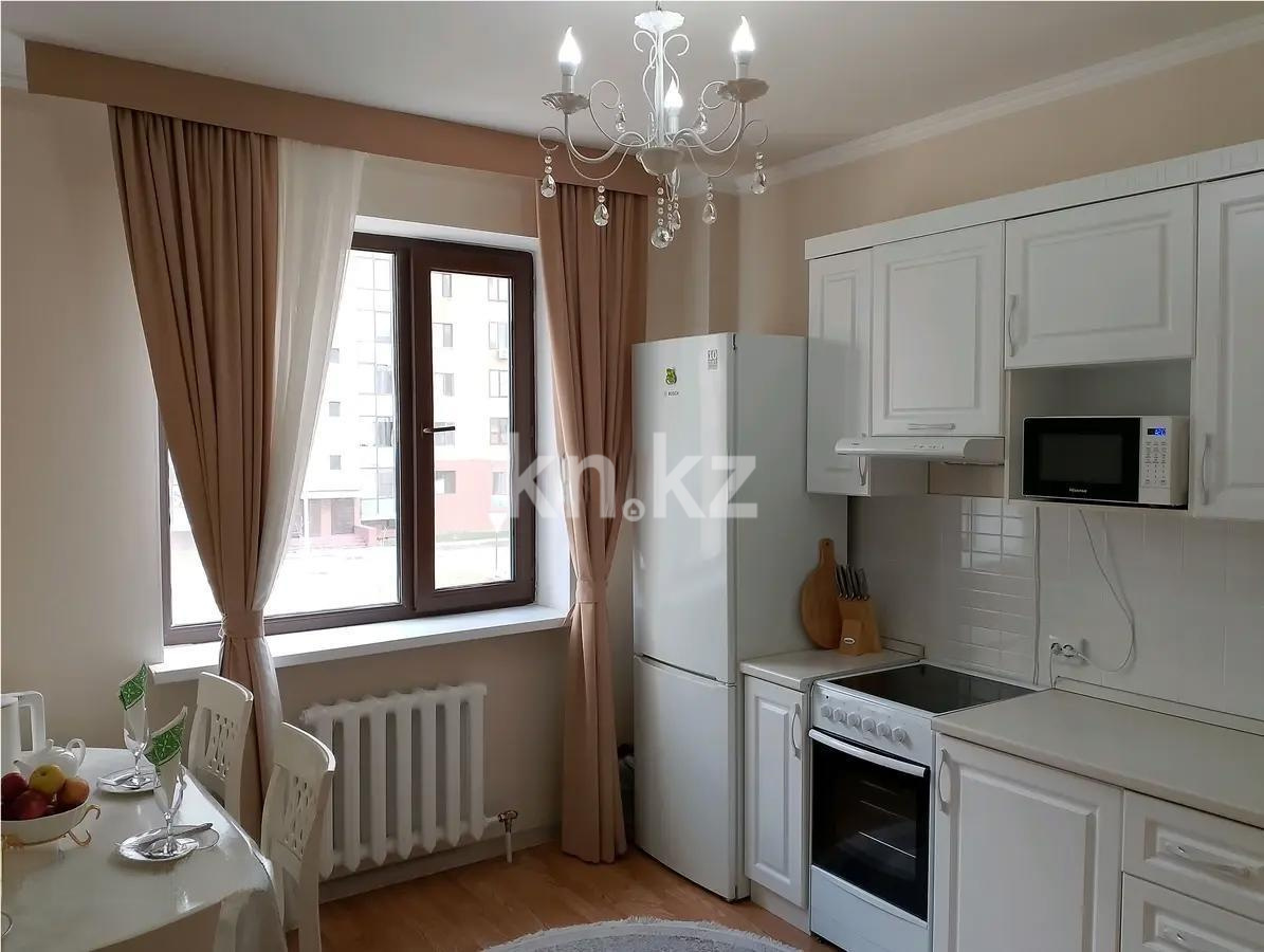 Продажа 1-комнатной квартиры, 40 м², ул. Сыганак, дом  2 в Астане - фото 2