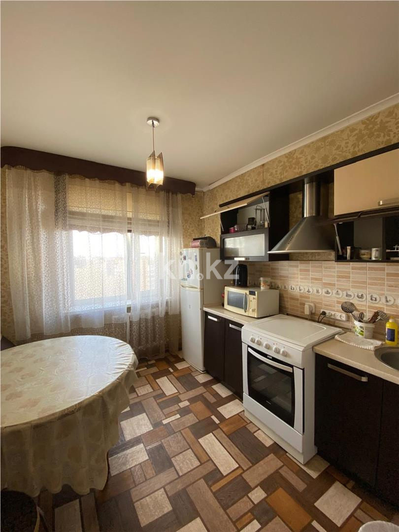 Продажа 2-комнатной квартиры, 55 м², мкр-н Гульдер-1 - Продажа квартир в Караганде фото 7 из 14