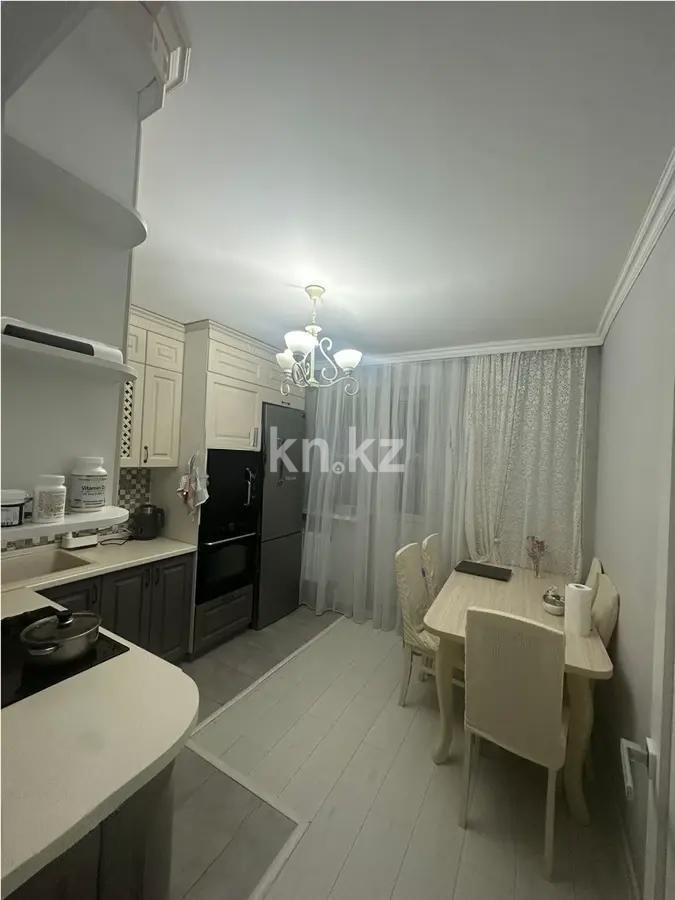 Продажа 2-комнатной квартиры, 52 м², пр. Кошкарбаева, дом  39 в Астане - фото 3