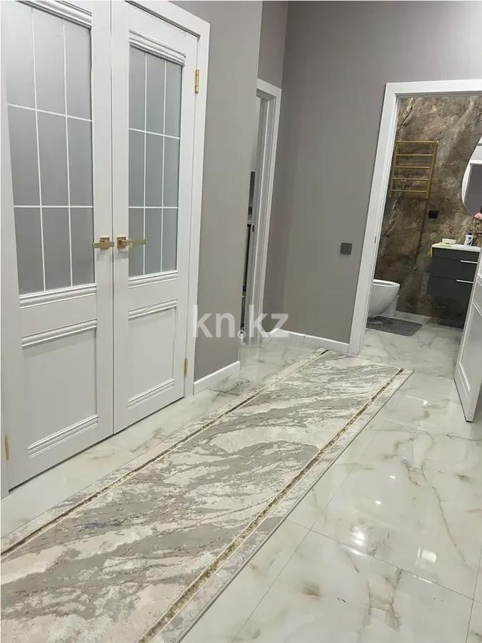 Продажа 2-комнатной квартиры, 62 м², ул. Толе би, дом  35/1 в Астане - фото 4