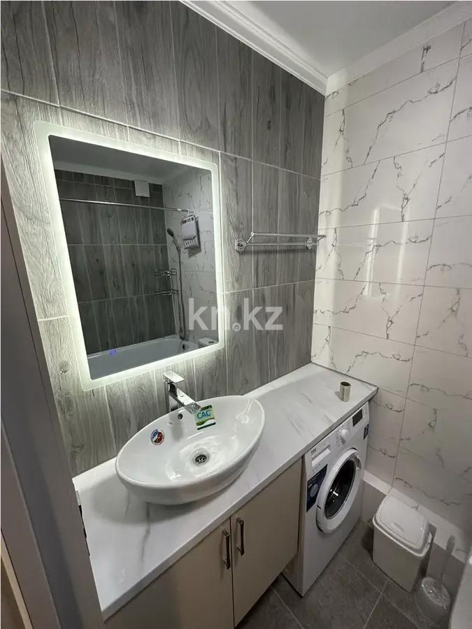 Продажа 2-комнатной квартиры, 52 м², ул. Толе би, дом  285/8 в Алматы - фото 4