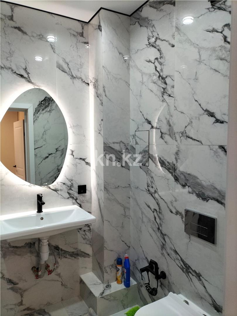 Продажа 2-комнатной квартиры, 66 м², ул. Нарикбаева в Астане - фото 7