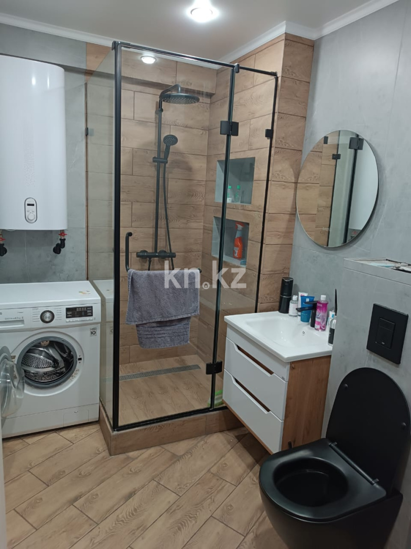 Продажа 2-комнатной квартиры, 64 м², ул. Момышулы в Караганде - фото 7