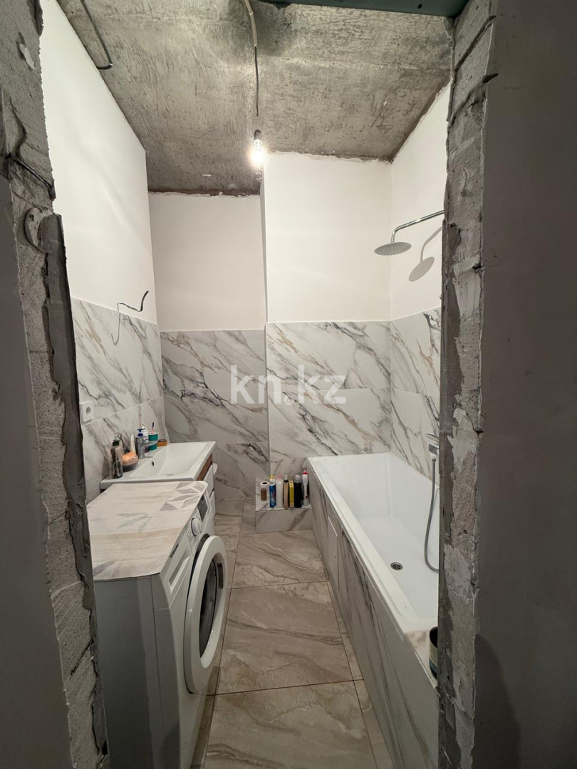 Продажа 1-комнатной квартиры, 47 м², пр. Туран, дом  50/2 - ул. Бухар жырау в Астане - фото 7