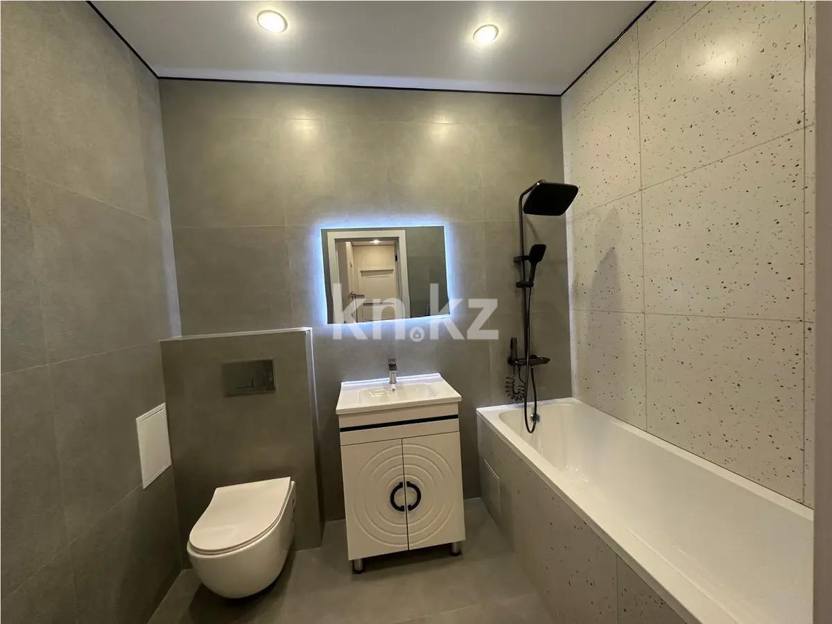 Продажа 2-комнатной квартиры, 56 м², ул. Сыганак, дом  32 в Астане - фото 5