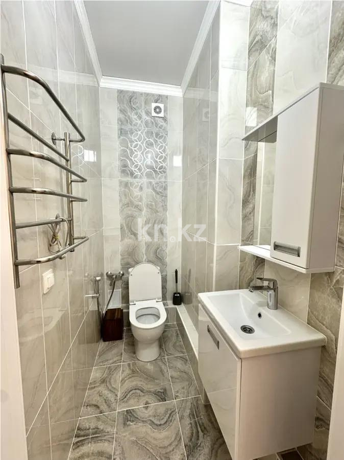 Продажа 2-комнатной квартиры, 68 м², ул. Толе би, дом  48/1 в Астане - фото 4