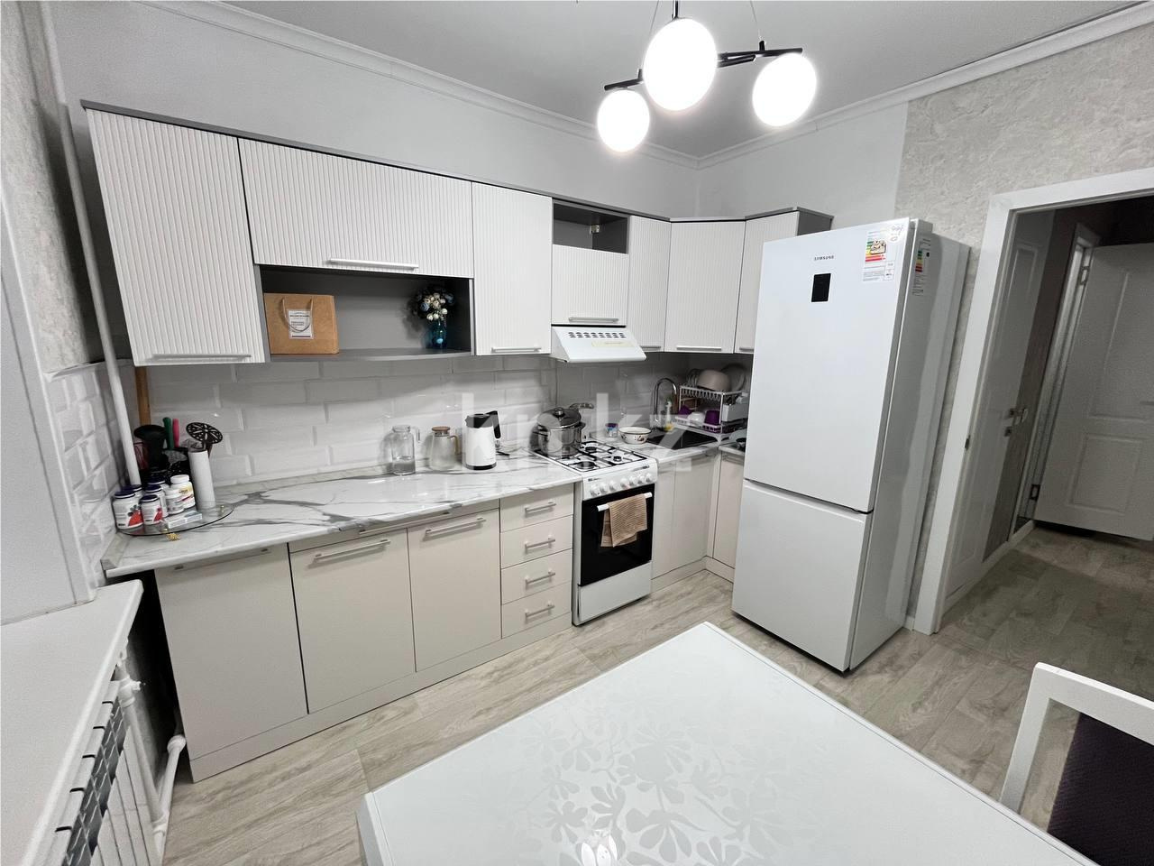 Продажа 2-комнатной квартиры, 53 м², мкр. Гульдер-1 в Караганде - фото 11