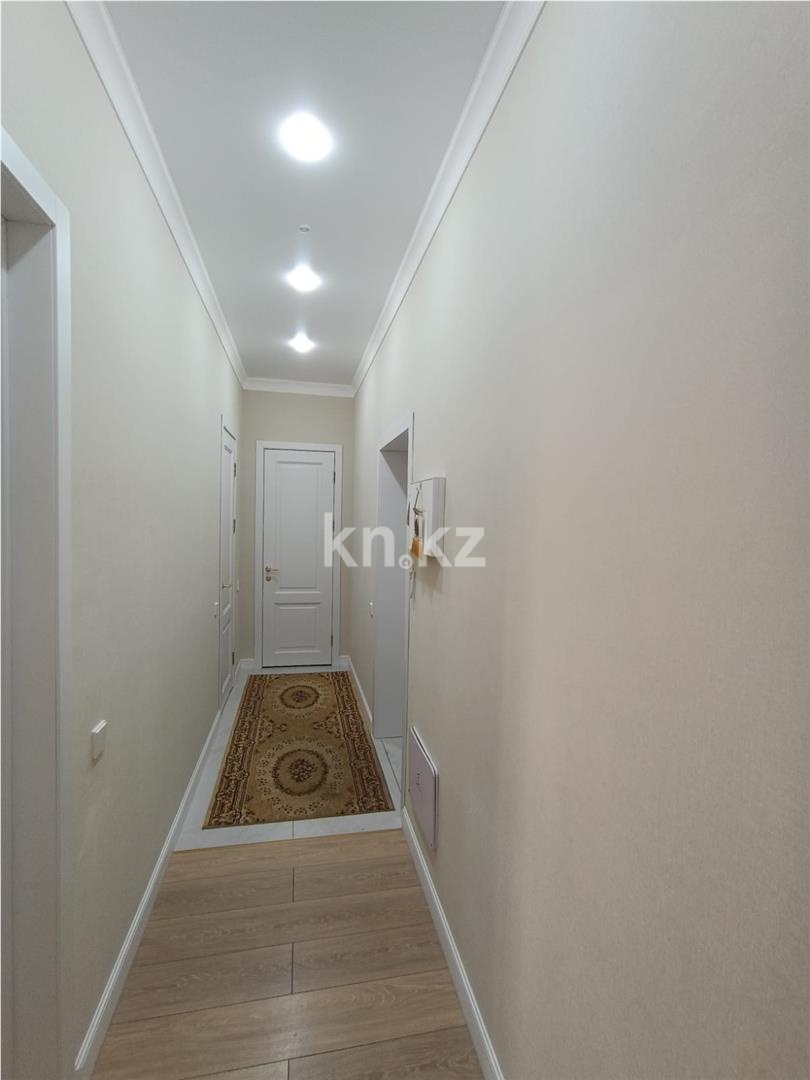 Продажа 2-комнатной квартиры, 60 м², ул. Токпанова в Астане - фото 11