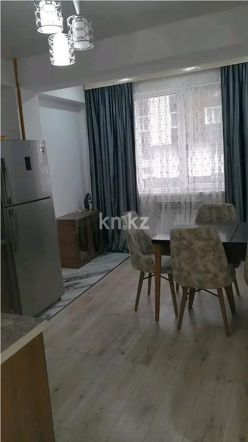 Продажа 1-комнатной квартиры, 50.2 м², мкр-н 20, дом  22 в Алматы - фото 2