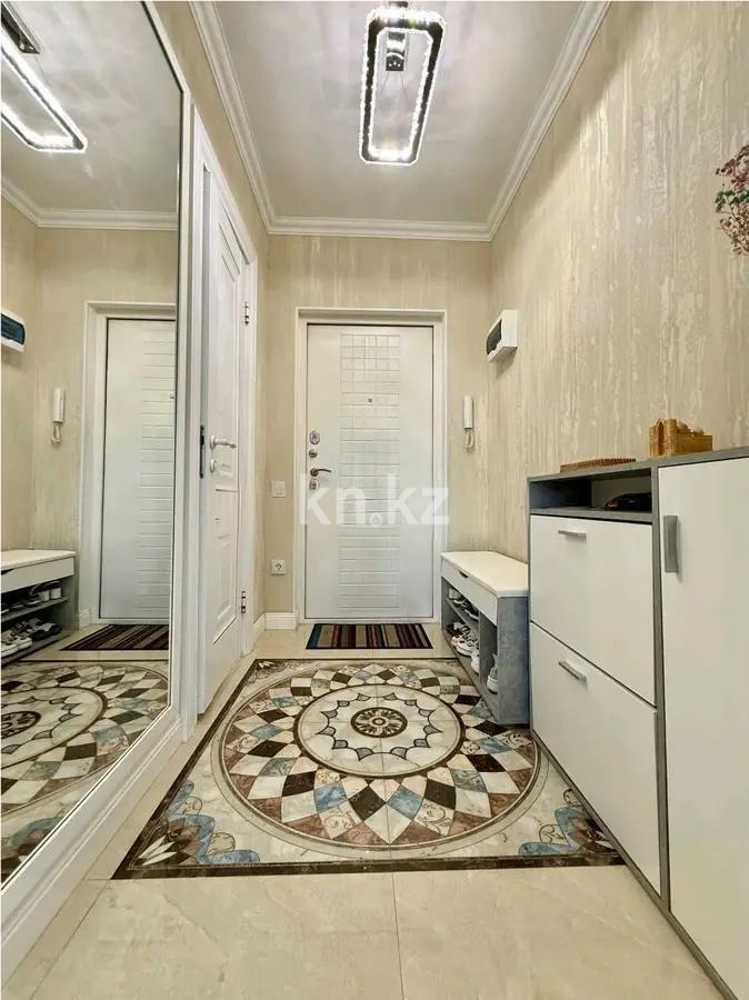 Продажа 2-комнатной квартиры, 57 м², мкр-н Аксай-5, дом  25 в Алматы - фото 4