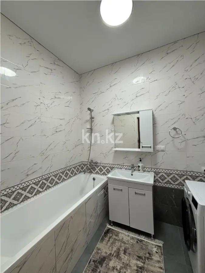 Продажа 2-комнатной квартиры, 47 м², ул. Бокейхана, дом  25 в Астане - фото 4