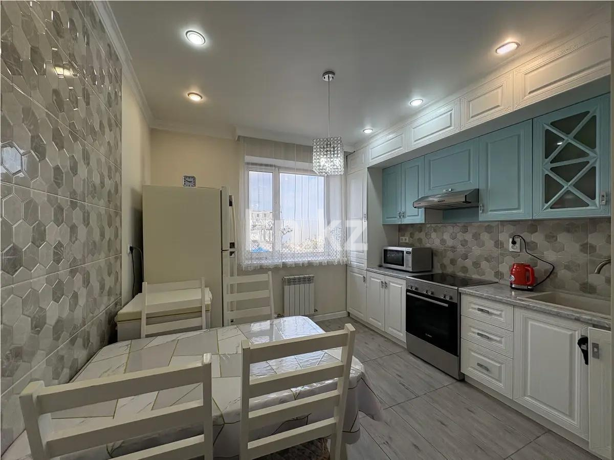 Продажа 2-комнатной квартиры, 56 м², пр. Кошкарбаева, дом  31 в Астане - фото 2