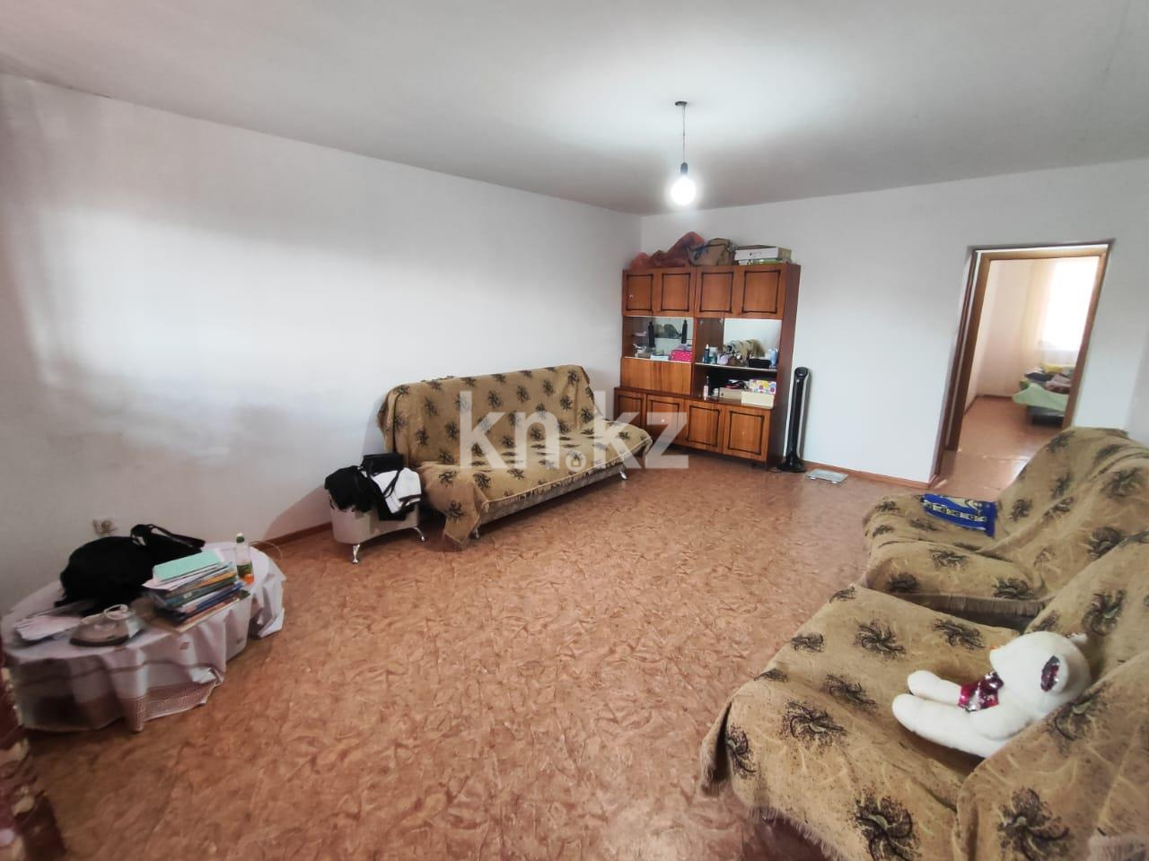 Продажа 2-комнатной квартиры, 59 м², мкр-н 15 в Караганде - фото 2