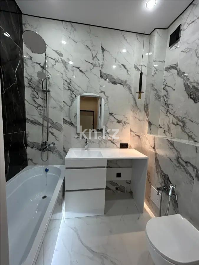 Продажа 2-комнатной квартиры, 48 м², ул. Толе би, дом  25а в Астане - фото 6