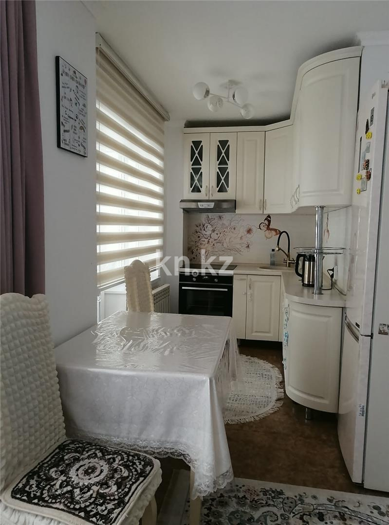 Продажа 2-комнатной квартиры, 54 м², ул. Ашимова, дом  28 - Продажа  двухкомнатных квартир в Караганде фото 7 из 14