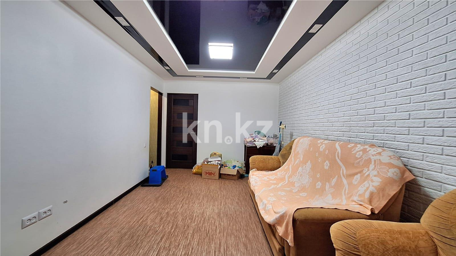 Продажа 2-комнатной квартиры, 48 м², мкр-н 16, дом  27 в Караганде - фото 2