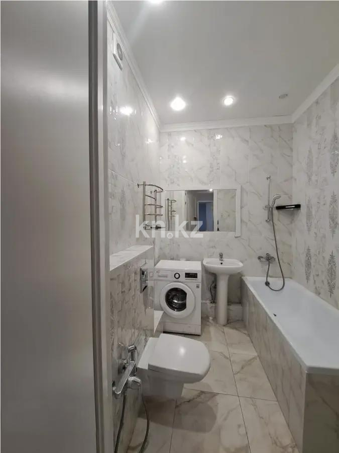 Продажа 2-комнатной квартиры, 65 м², ул. Туркестан, дом  28/2 в Астане - фото 4